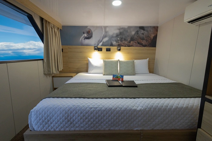 Bett in einer Doppelkabine der Galapagos Motoryacht Bonita